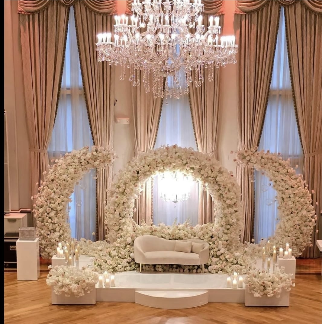 Large white floral stage, loveseat and chandelier — Milton Georgia